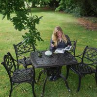 Female Sat at Henley Four Seater Garden Set 