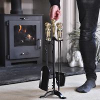 Traditional Polished Brass & Black Companion Set in Living Room Setting
