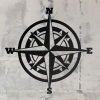 Compass Wall Art in Situ on a Grey Wall
