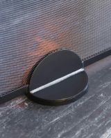 Close-Up of Integral Feet for Contemporary Black Arched Single Panel Fireguard with Mesh