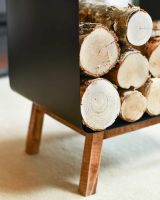 Close-Up of Contemporary Black Steel & Wooden Log Holder
