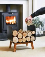 Scale Shot on Contemporary Black Steel & Wooden Log Holder