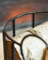 Close Up Of Black Contemporary "Oval" Design Log Holder Edges