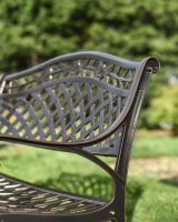 Close up of latticed back on garden bench 