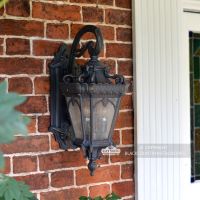 "Cotsworld Collection" Ornate Top Fix Wall Lantern in Situ Next to a Front Door