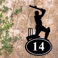 Cricket Player Iron House Number Sign in Situ on a Rustic Wall 
