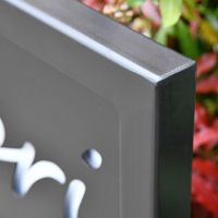 Close-up of the Black Finish on the Iron Sign