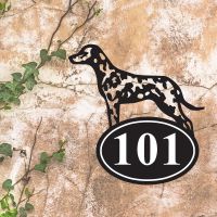 Dalmatian Iron House Number Sign in Situ on a Rustic Wall 