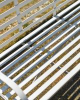 Close up of bench seat detailing on three seater garden bench