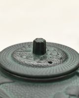 Close up of Lid on Oriental Style Teapot