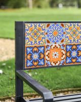 Close-Up of Ceramic Backplate on Deluxe "Blue Marine" Steel Two Seater Park Bench in Black