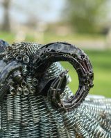 Close-Up of Arched Horn on Recycled Ram Garden Sculpture