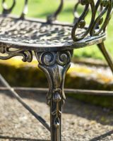 Close-Up of Patterned Legs for Two-Seater Garden Bench