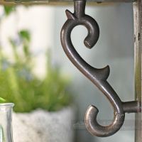 Detailed Scroll Work On Cast Iron Shelf Bracket