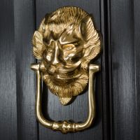 "Downing street lion" Door Knocker on a Black Door