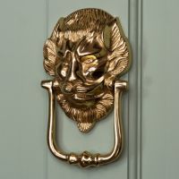 "Downing street lion" Door Knocker on a Green Door