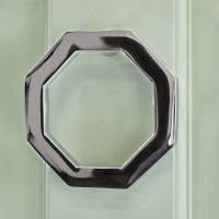 Bright Chrome Modern Octagonal door knocker on Green door