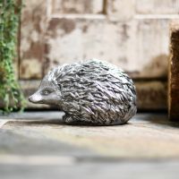 Novelty animal door stop by rustic door