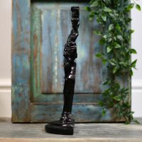 Cast iron gold door stop side view
