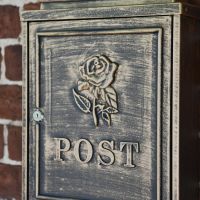 Close up of Rose Motif & POST lettering 