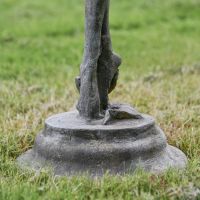 Close up of Tiered Base on Rustic Grey Garden Ballerina Sculpture 