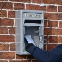 Door open on Grey & Gold Post Box 