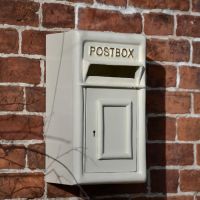 Traditional Cream & Gold Wall Mounted Post Box on Wall