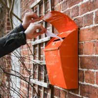 Side view of “Sunkissed Sienna” Orange Contemporary Post Box on Wall 