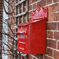 Side view of “Pomodoro” Goldhay Secure Post and Parcel Box