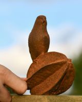 Scale Shot of Rustic "Bird On Seed" Garden Sculpture
