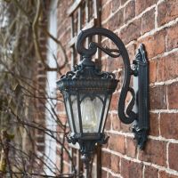 Side view of "Cotsworld Collection" Medium Ornate Bronze Top Fix Wall Lantern