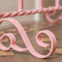 Close up pink scrollwork frame 