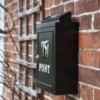 Side view of "Black & White Cow" Wall Mounted Post Box