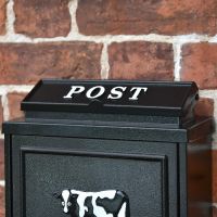 Close up of "POST" lettering and lid 