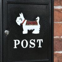 Close up of "White Westie" Motif on Black Post Box 