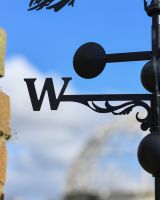 Witch on her broom weathervane West arm