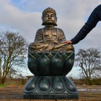 Antique Gold Buddha Sculpture with hand for scale 