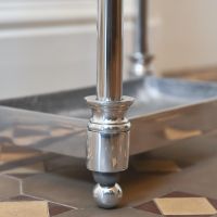 Close up of Antique Nickel Umbrella Holder 