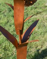 Close-up of the Rustic Metal Finish on the Flower Sculpture