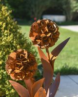 Metal Rustic Flowers on top of the Garden Sculpture