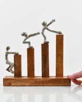 Scale image of cast aluminium and mango wood home decor sculpture