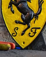 Close up of "Ferrari" Cast Iron Vintage Style Sign finish 