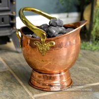 Traditional Copper Coal Bucket Holding Coal