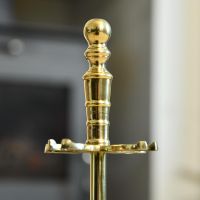 Close up of polished brass central pole 