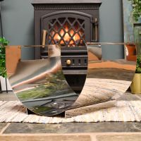 Stainless Steel Curved log holder infront of fire