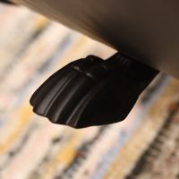 close up of foot under log holder