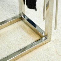 Close up of Polished Stainless Steel Log Holder 