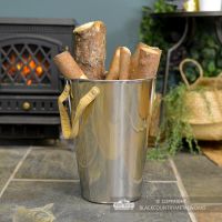 Stainless Steel Log Holder in Situ Holding Logs Next to the Fireplace