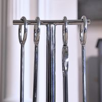 Close up of T Bar with circular handles 