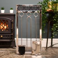 Sleek modern companion set in living room by log burner